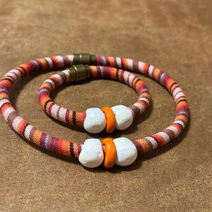 Striped Necklace with White and Orange Accents
